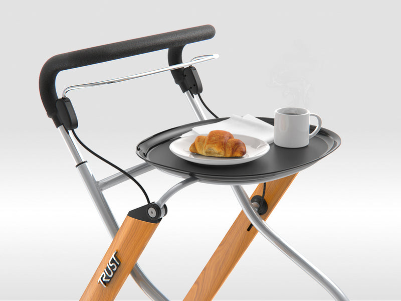 Load image into Gallery viewer, Närbild på rollator med bricka med kaffe och bulle på.