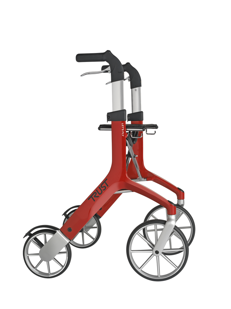 Load image into Gallery viewer, Röd Let’s Fly rollator från Trust Care, lättviktsdesign med stora hjul. Bild tagen i profil.