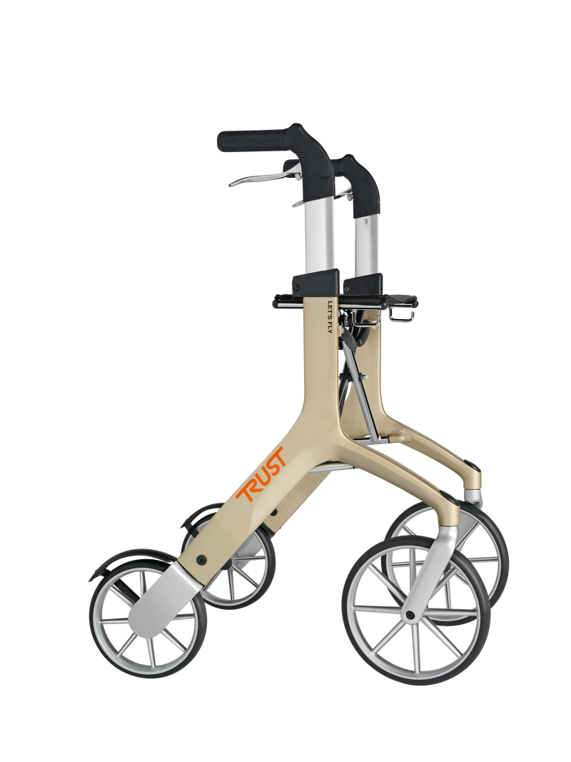 Load image into Gallery viewer, Beige Let’s Fly rollator från Trust Care, enkel att fälla ihop och stabil. Sedd i profil.