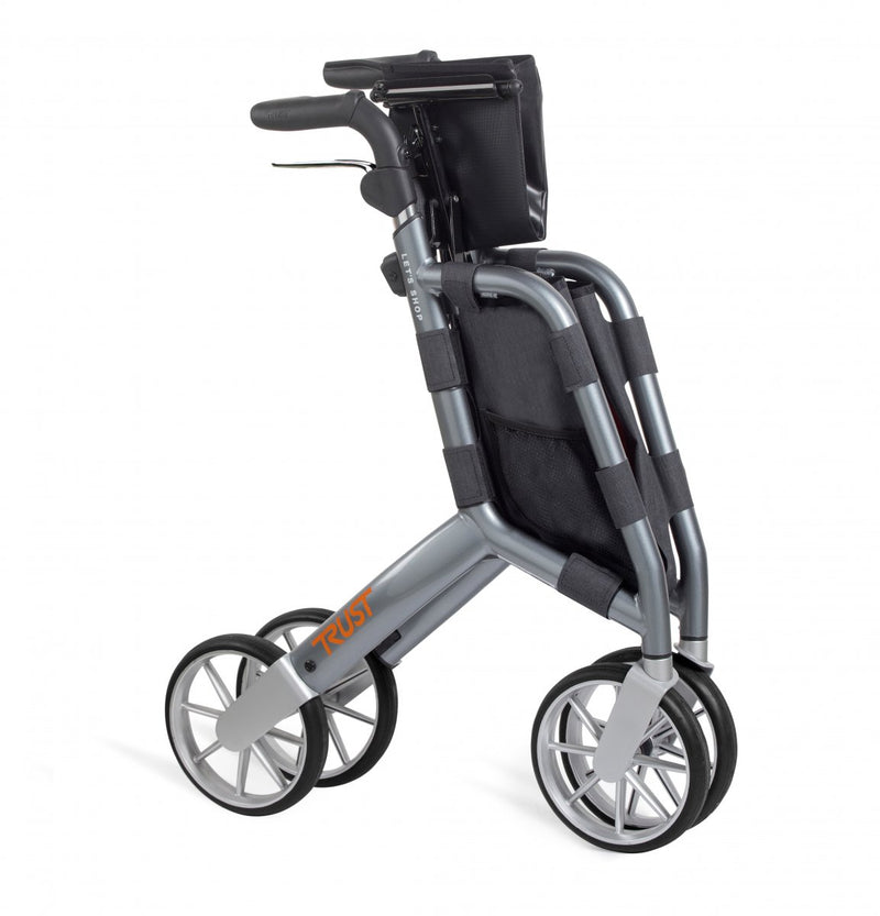 Load image into Gallery viewer, Grå Let’s Shop rollator från Trust Care, ihopfälld. Tagen i profil.