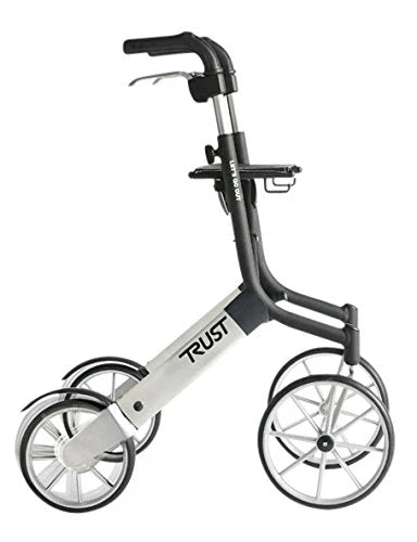 Load image into Gallery viewer, Svart/silver Let’s Go Out rollator från Trust Care tagen i profil, med justerbara handtag och stora hjul.